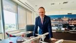 Air Serbia CEO Jiri Marek in his Belgrade office with four models of A330-200s.