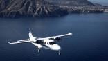A Tecnam P2012 Traveller inflight. 